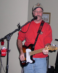 Jack Burt from the "Hats Off Band" Plays guitar and sings